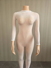 A sheer, skin-toned long-sleeve bodysuit or tights displayed on a mannequin against a light wood-paneled wall.