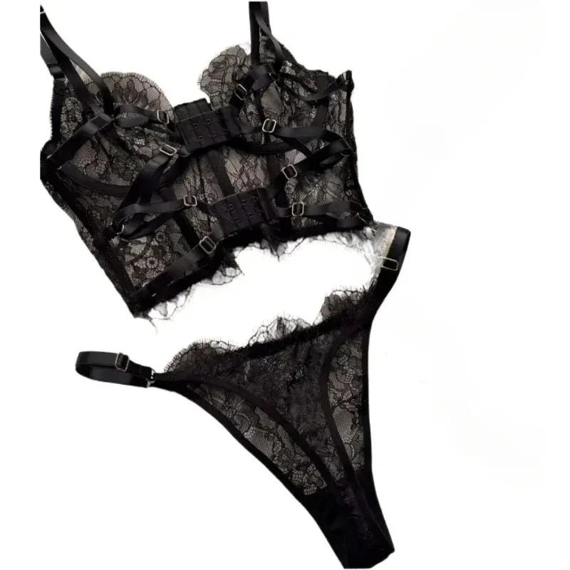 Black lace lingerie set on a white background