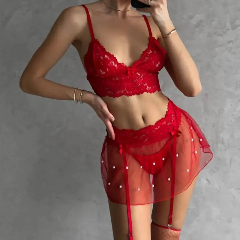 Red lace lingerie set on a plain background