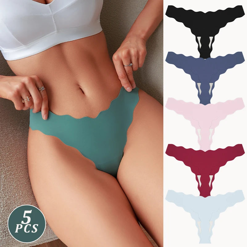 Person wearing teal underwear with color swatches on a neutral background