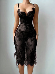 Black lace dress on a plain background