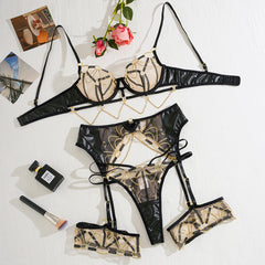 Black and beige lingerie set with floral decorations on a white background