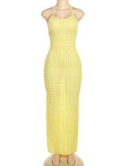 Yellow dress on a mannequin with 'kliou' branding on a white background