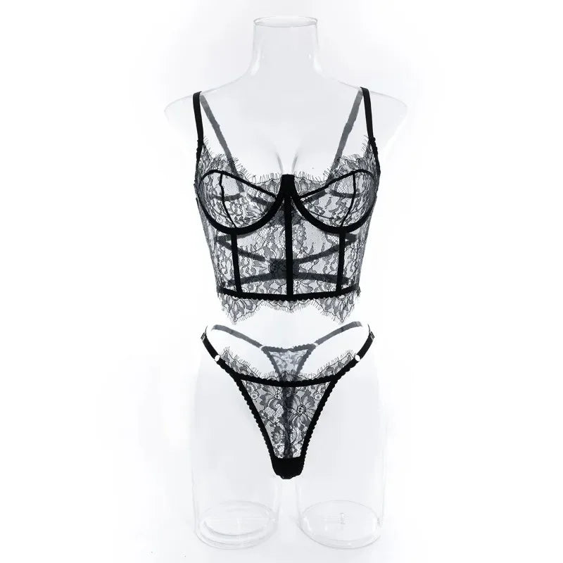 Black lace lingerie set on a mannequin against a white background