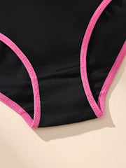 Black swimsuit with pink straps on a beige background