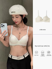 Woman wearing a white bra with a phone, followed by an image of the bra and brand details.