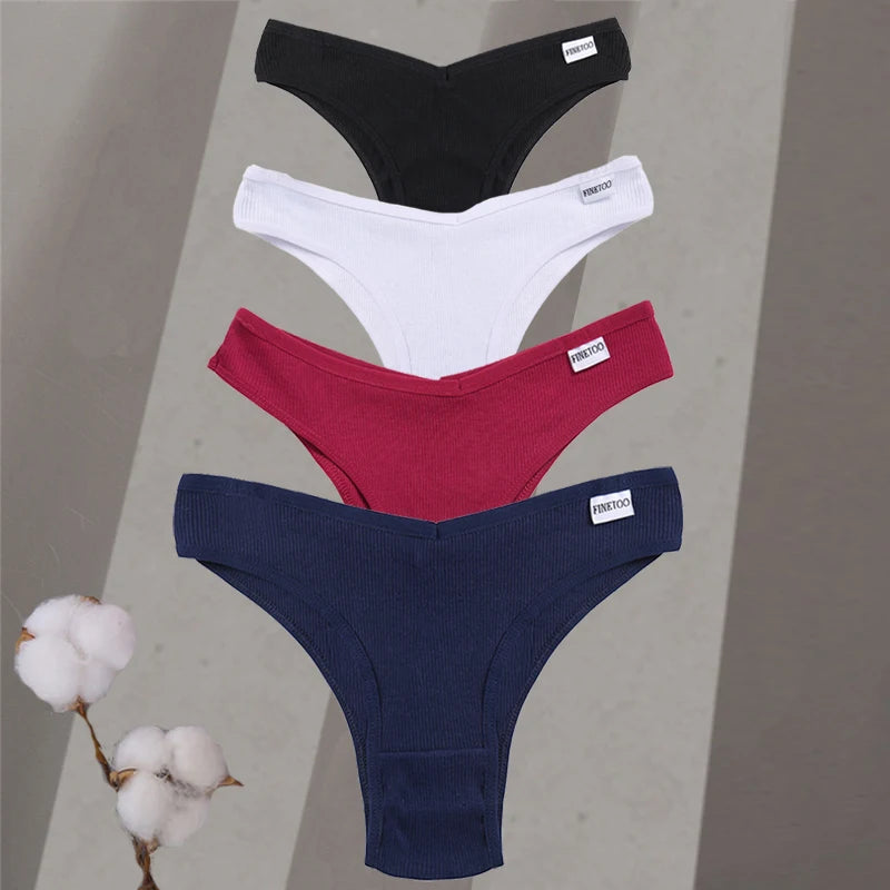 Four pairs of men's underwear in black, white, red, and blue on a gray background with cotton plant.