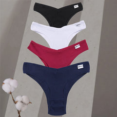 Four pairs of men's underwear in black, white, red, and blue on a gray background with cotton plant.