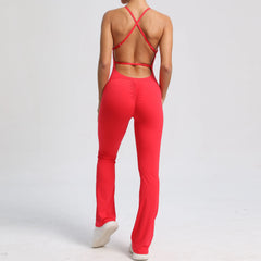 Person wearing a red jumpsuit with criss-cross back design on a white background