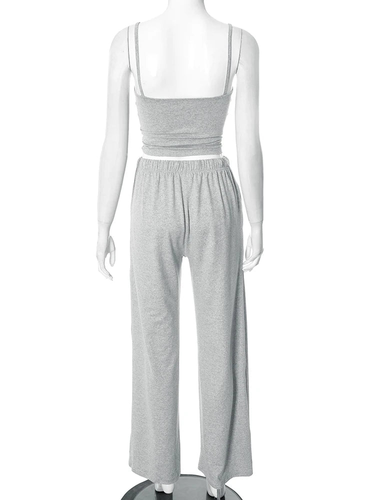 Mannequin wearing a gray jumpsuit on a white background