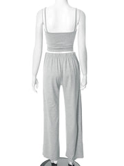 Mannequin wearing a gray jumpsuit on a white background
