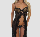 Black lace lingerie with leopard print details on a plain background