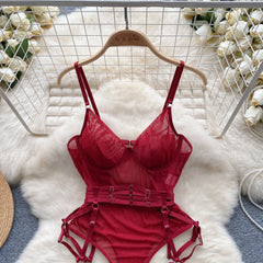 Red lingerie set on a hanger with a white floral background