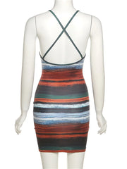 Multicolored striped dress on a mannequin against a white background