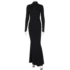 Black long-sleeve dress on a mannequin against a white background