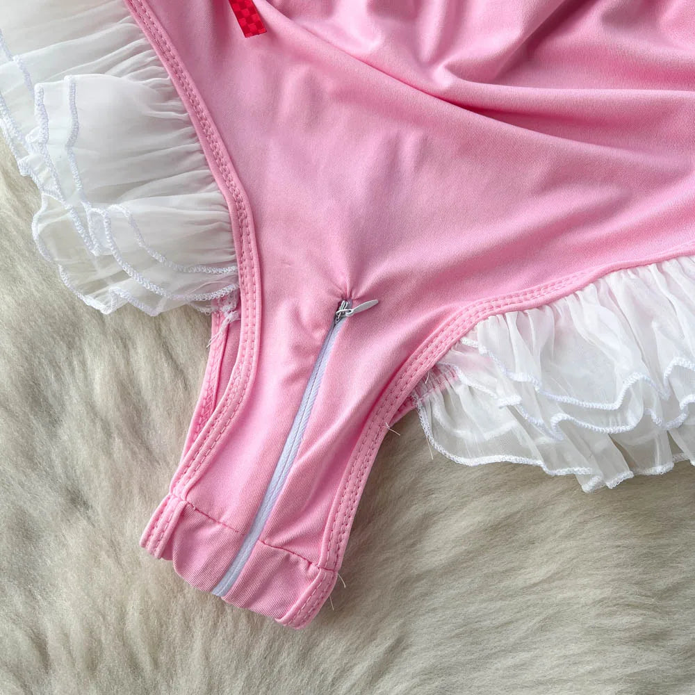 Pink underwear with white lace trim on a fur surface