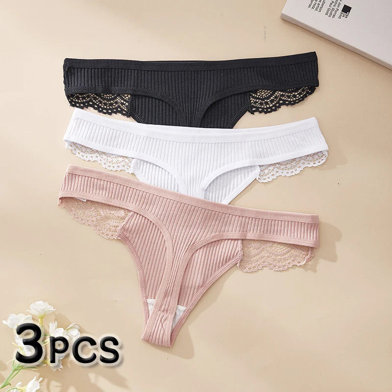 Three ribbed lace-trim thongs in black, white and blush pink