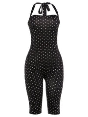 Black polka dot jumpsuit with white dots on a white background