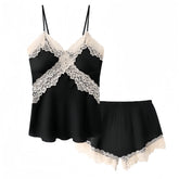 Black lace-trimmed nightgown set on a white background