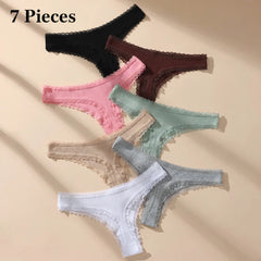 Set of six lace-trimmed panties in various colors on a beige background