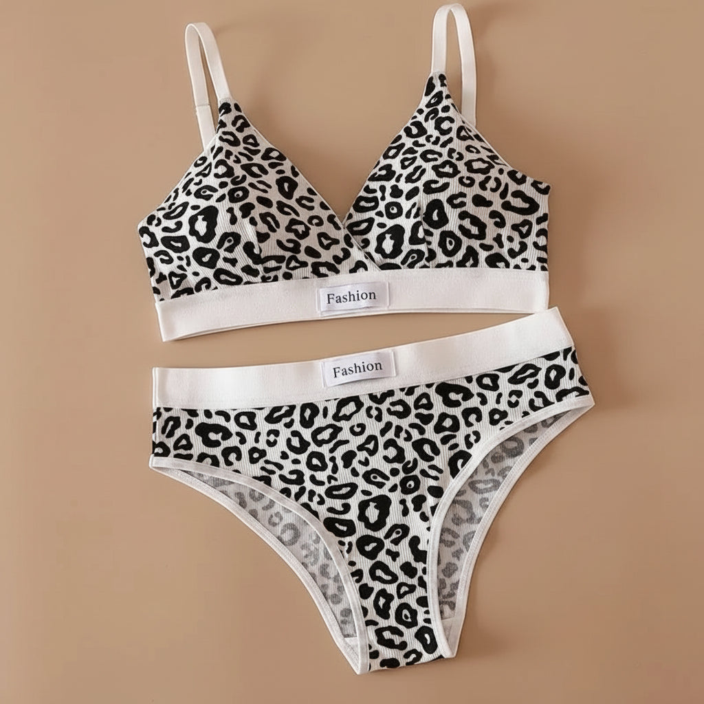 Leopard print bra and panties set on a beige background