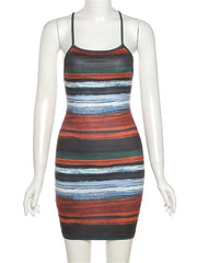 Multicolored striped dress on a mannequin against a white background