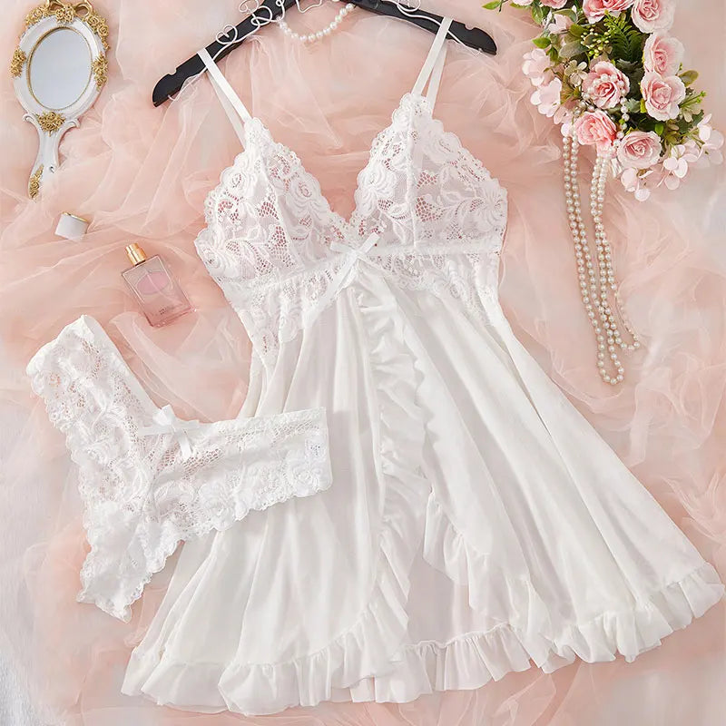 White lace nightgown on a pink background with flowers and a mirror.