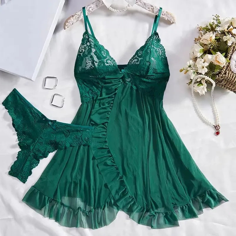 Green lace lingerie set on a white background with flowers and jewelry.