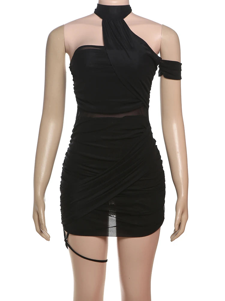 Black one-shoulder dress on a mannequin against a white background