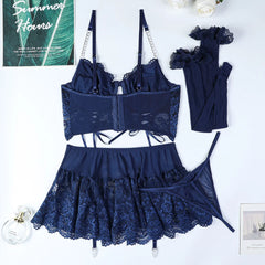 Navy blue lace lingerie set with matching accessories on a white background