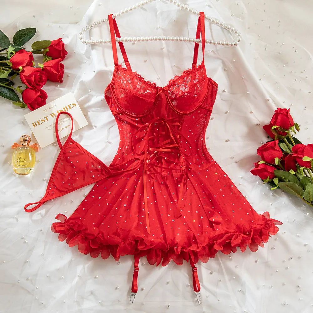 Red lace lingerie set on a white background with flowers and a book.