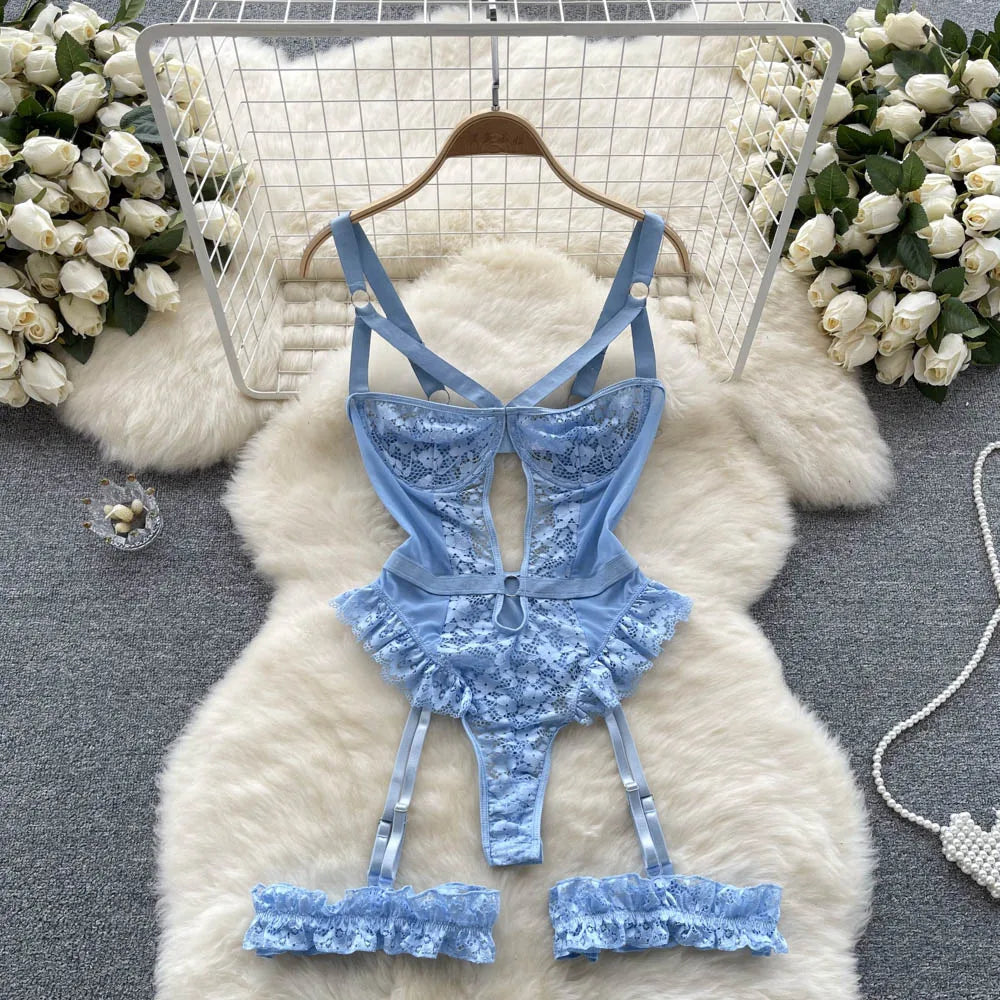 Blue lace lingerie set on a hanger with floral decorations in the background