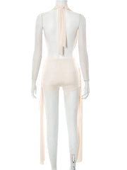 Mannequin wearing a beige sleeveless top with a bow detail on a white background