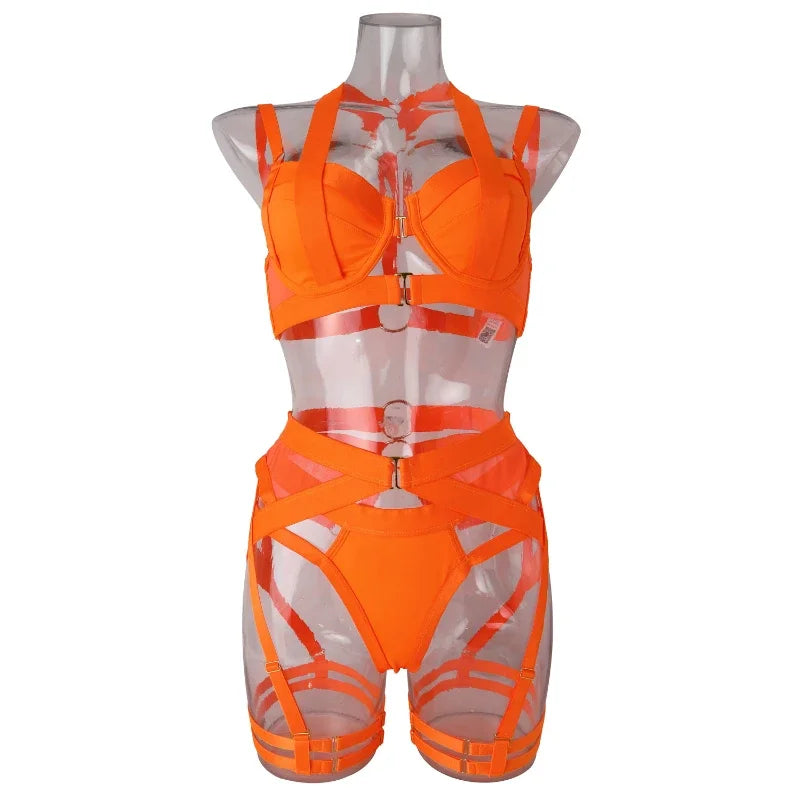 Orange and clear two-piece outfit on a mannequin against a white background