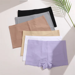 Set of women's underwear in various colors on a light background