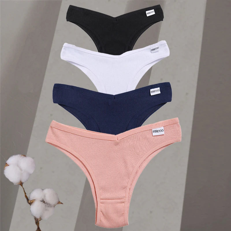 Four pairs of underwear in black, white, blue, and pink on a gray background with cotton branches.