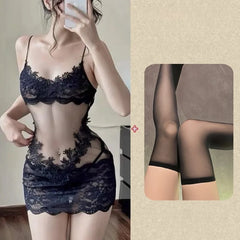 Black lace lingerie set worn by a model with inset of sheer stockings.