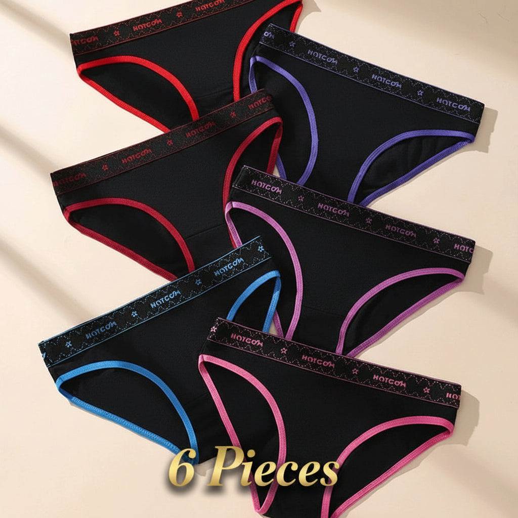 Set of black women's underwear with colorful trim on a beige background