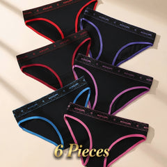Set of black women's underwear with colorful trim on a beige background