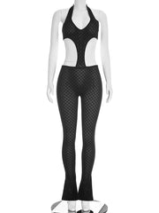 Black and white patterned outfit on a mannequin against a white background