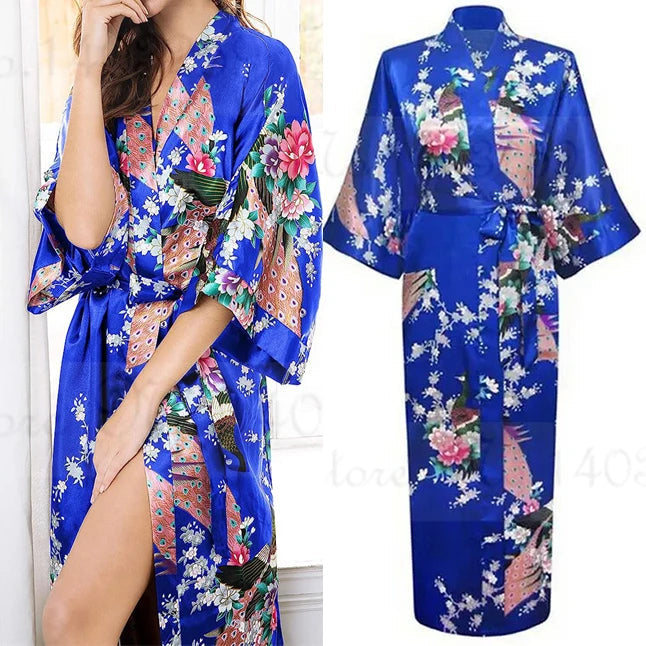 Blue floral satin robe with a model wearing it, showing a close-up of the design.