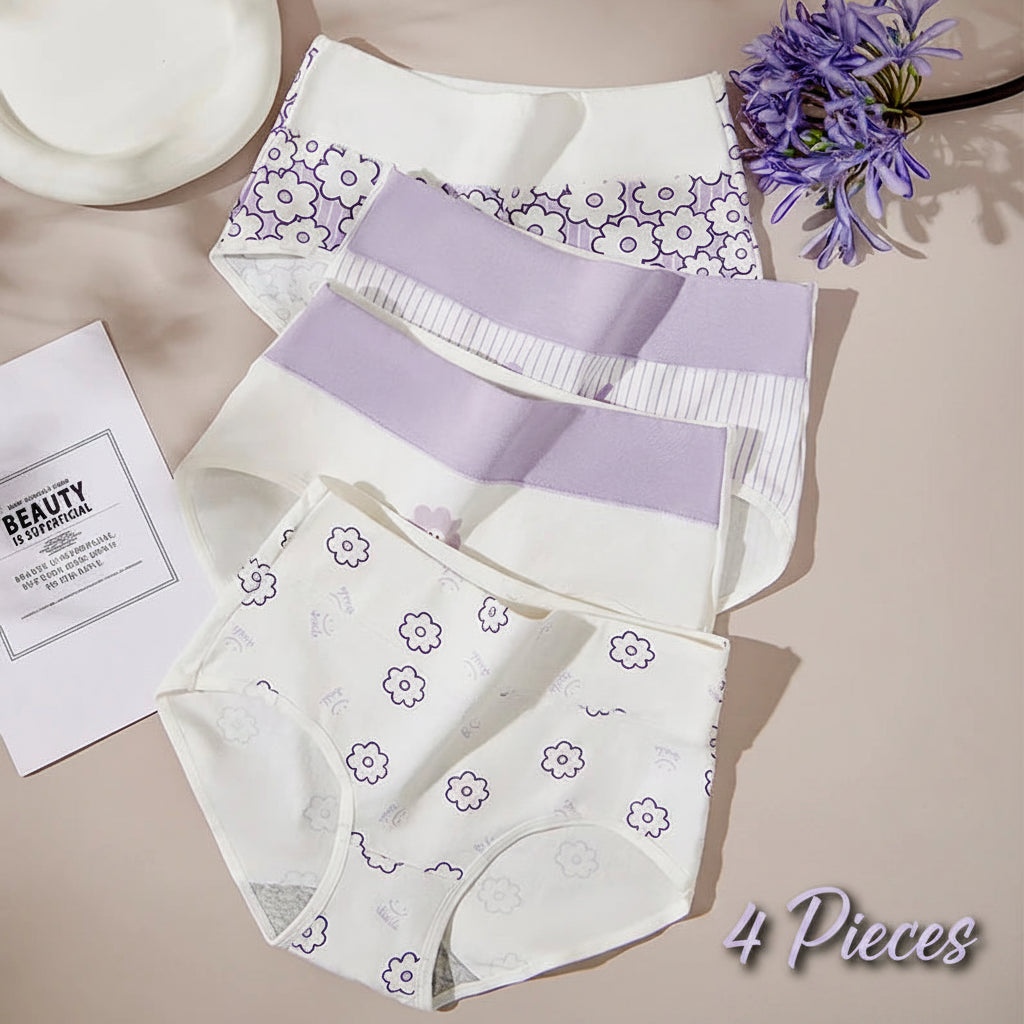 Set of women's underwear with floral patterns on a beige surface.