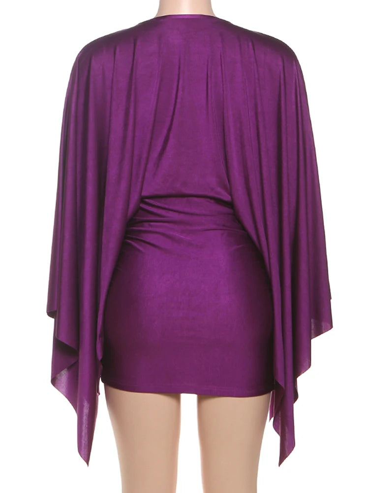 Purple satin outfit with a draped design on a white background