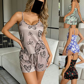 Woman wearing a patterned pajama set with 'Cute Byte' branding, surrounded by other similar outfits.