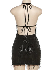 Black fringe dress with halter neck on a mannequin against a white background