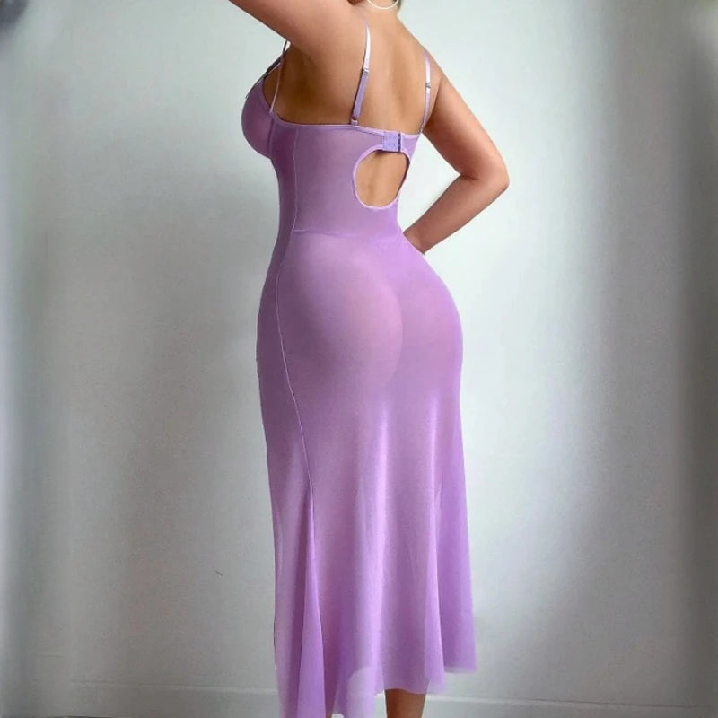 Purple dress with cut-out design on a plain background