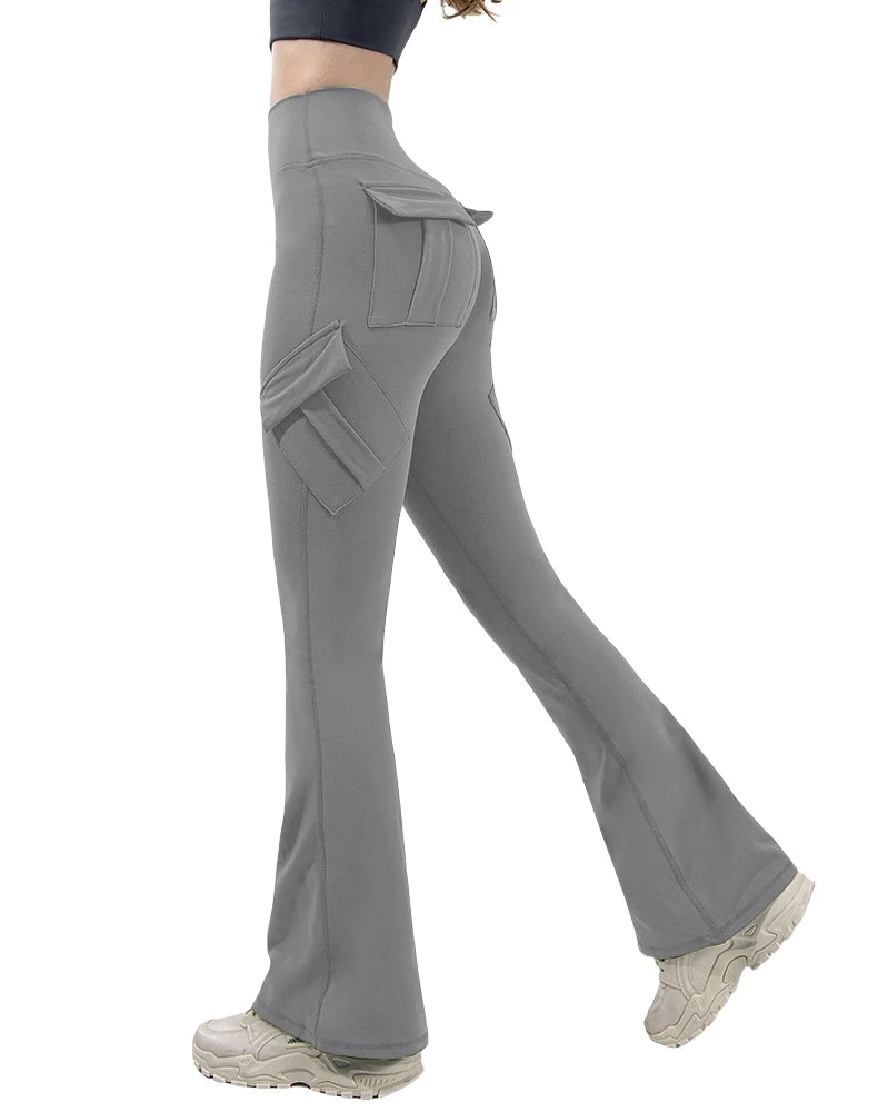 Gray flared pants worn by a person on a white background
