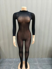 Mannequin wearing a black bodysuit with sheer panels against a gray background
