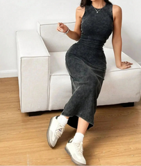 Woman in charcoal round-neck sleeveless bodycon cami dress, ankle-length casual summer outfit.