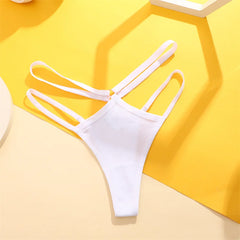 White bikini bottom on a yellow geometric background